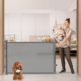 Cideny 76wide retractable gate extended across a doorway for wide openings and safety.