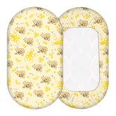 cidobi Winnie bassinet sheet honey theme closeup fabric showing soft breathable texture for baby comfort