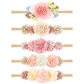 Cinaci 5-piece flower headbands set showing soft nylon stretch for daily wear