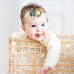 Cinaci baby headbands used as photo props for adorable portraits