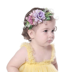 Cinaci floral headband purple; gentle elasticity for growing babies.