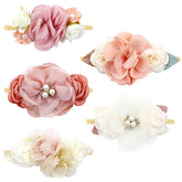 Cinaci flower headband ivory close-up shows soft fabric and delicate embellishments