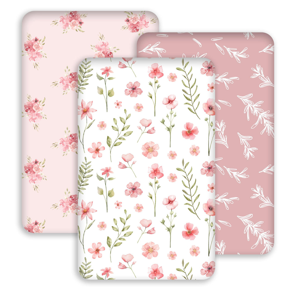 Civarua Kids pink floral bassinet sheet fabric close-up highlighting soft, breathable material.