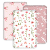 Civarua Kids pink floral bassinet sheet fabric close-up highlighting soft, breathable material.