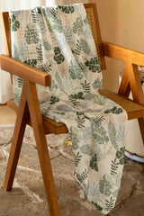 Civarua Kids muslin swaddle blanket on a newborn, showcasing breathable wrap