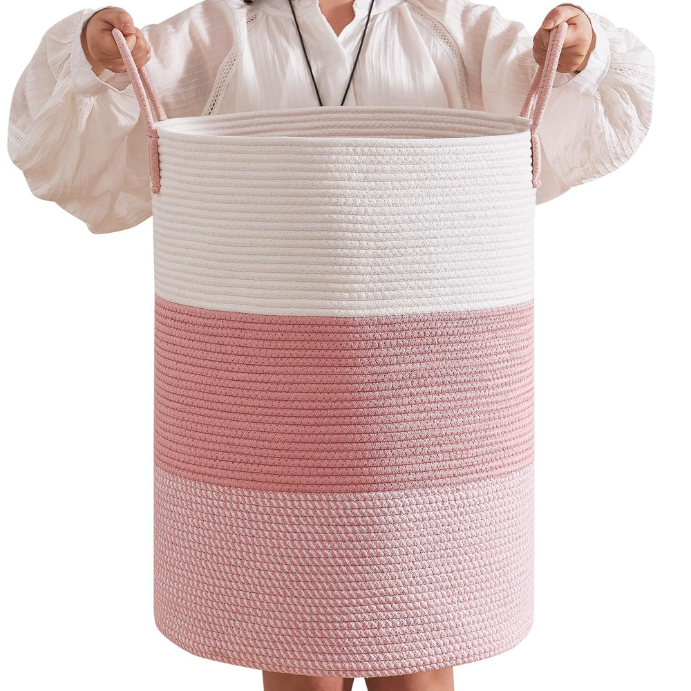 CLHMILY&Z pink round laundry basket with oversized handles for easy transport.