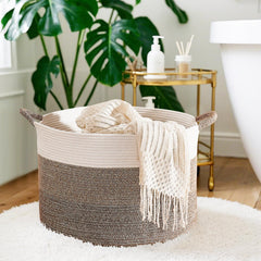 CLHMILY&Z basket with oversized handles for easy transporting blankets and towels.