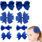 Clipband baby bows blue 2inch closeup with secure alligator clips for fuss-free wear.