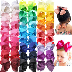 Clipband big 6-inch bows in assorted colors for versatile toddler outfits.