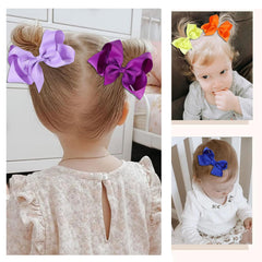 Clipband hair bows shown on a girl’s hair demonstrating versatile styling and secure hold