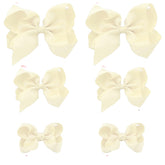 Clipband Ivory Bows 6-pack laid out for versatile daily styling.