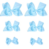 Clipband Sky Blue Bows set with alligator clips secures daily ponytails.