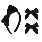 Clipband Velvet Bow Headband black offers luxe texture and all-day comfort.