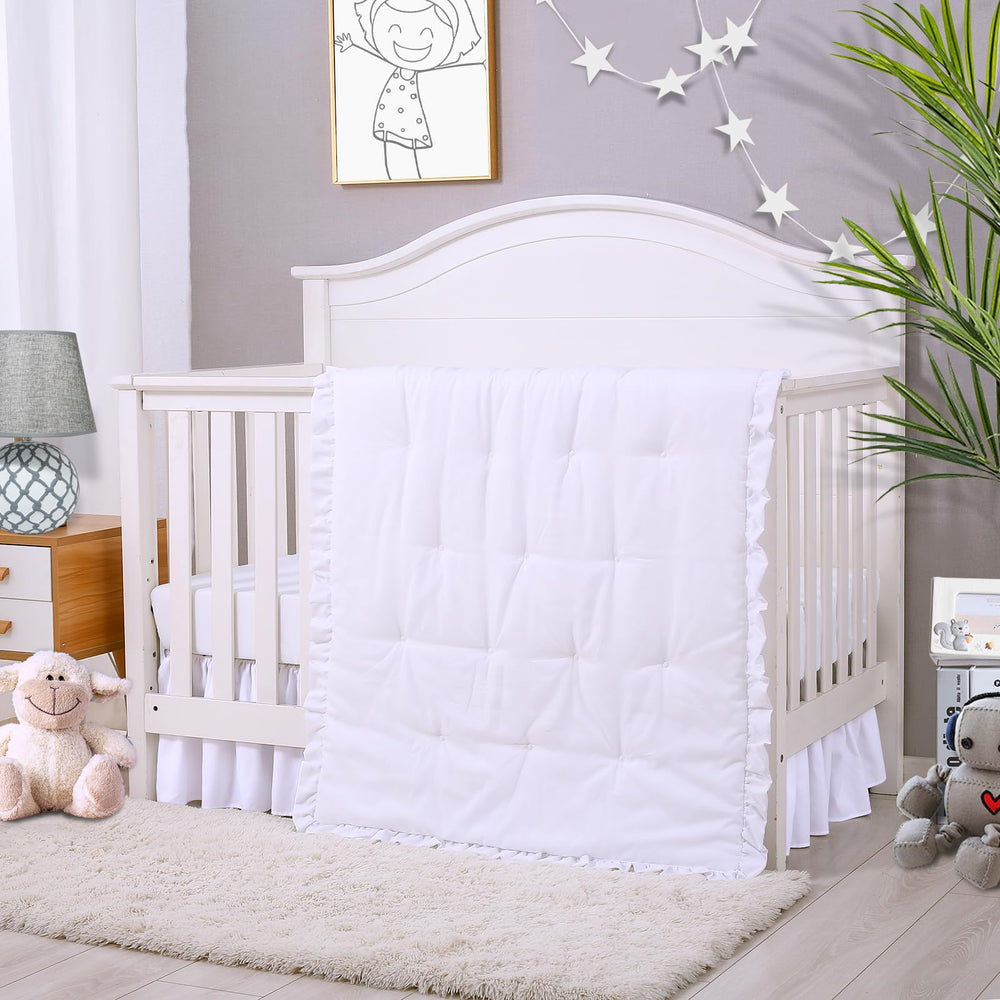 Cloele 3-piece crib bedding set in white with a 2-inch ruffle for gentle styling