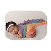 Coberllus newborn wrap rainbow close-up shows soft knit texture for cozy photos.