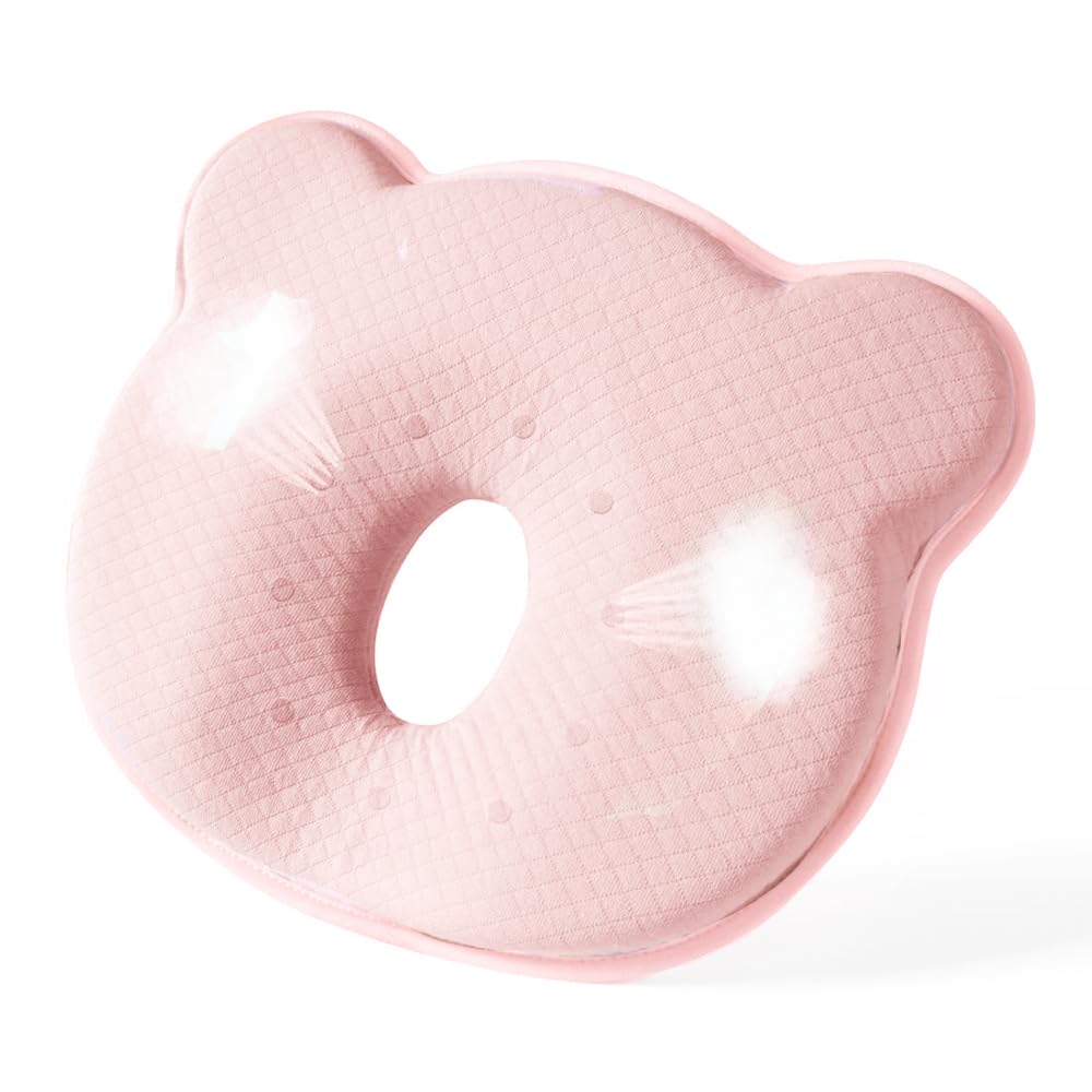 Cococu memory foam baby pillow provides head support in crib for gentle comfort