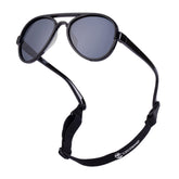 COCOSAND baby sunglasses with strap and polarized lenses protect eyes on sunny days.