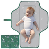 Coinarin Portable Changing Pad open with 27x21 inch surface for comfortable diaper changes.