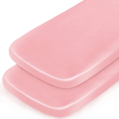 Coldwind satin bassinet sheet pink folded, showcasing silky texture for gentle sleep comfort.