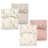 ColoBrethy crib sheet apricot pink floral close-up showing a gentle print for nursery charm.