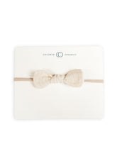 Colored Organics dainty bow headband natural muslin close-up shows soft organic cotton for sensitive skin