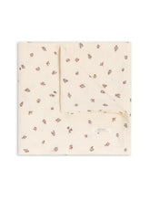 Colored Organics swaddle Helen Floral pattern offers soft, breathable newborn comfort.