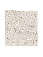 Colored Organics baby swaddle Pamela Floral Mist Navy front fold shows soft organic cotton for gentle cuddles