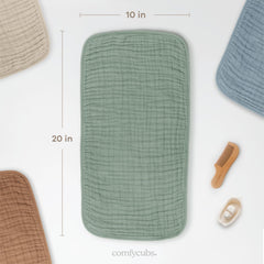 Comfy Cubs baby burp cloths draped over shoulder for full coverage.