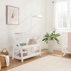 Comfy Cubs changing table with two open shelves keeps nappies within easy reach.