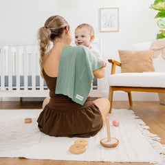 Comfy Cubs burp cloths folded, travel-ready for on-the-go feedings