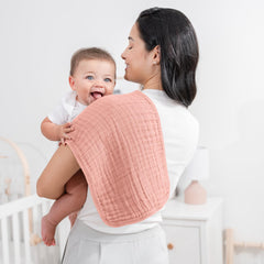 Comfy Cubs burp cloths show six-layer muslin for enhanced absorption.