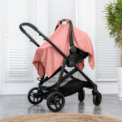 Comfy Cubs car seat cover with snap closure ensures secure fit on the go