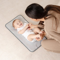 Comfy Cubs changing pad waterproof surface for quick wipe-clean changes.