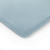 Comfy Cubs muslin bassinet sheet fold — portable softness for on-the-go naps.