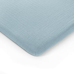 Comfy Cubs muslin bassinet sheet fold — portable softness for on-the-go naps.