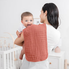 Comfy Cubs Muslin Burp Cloths 6-layer closeup highlights ultra-absorbent protection against messes.