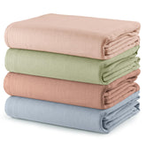 Comfy Cubs muslin swaddle blanket 47x47 provides secure swaddling and full-coverage comfort.
