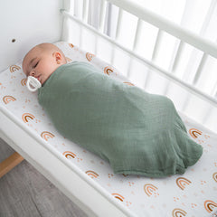 Comfy Cubs muslin swaddle blankets 47x47 laid flat for full coverage and secure swaddling.