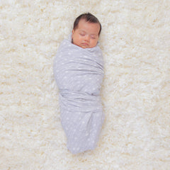 Comfy Cubs muslin swaddle blankets open layout showing generous 47x47 coverage for versatile use.