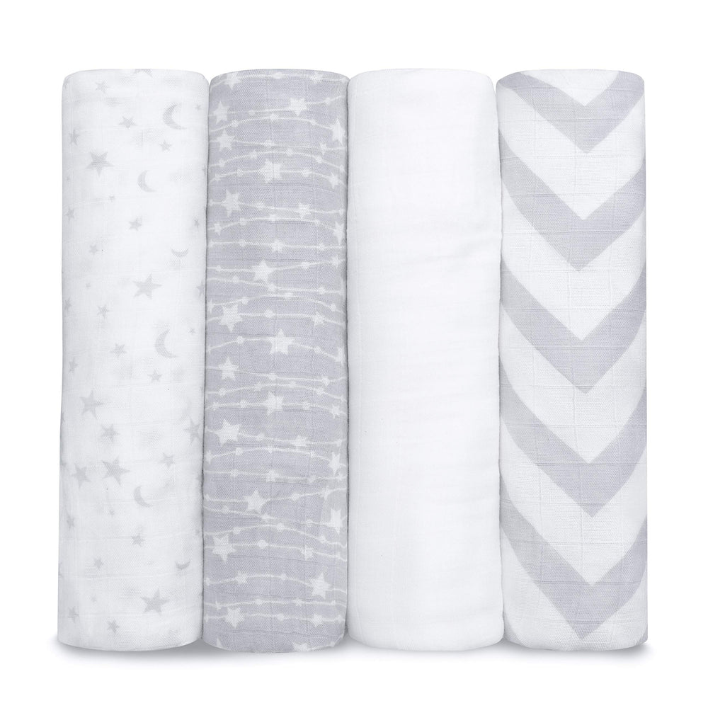 Comfy Cubs muslin swaddle blankets 4-pack folded view for gentle, breathable baby comfort.