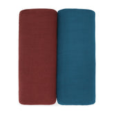 Comfy Cubs muslin swaddle in wine, close-up of soft fabric for all-season comfort.
