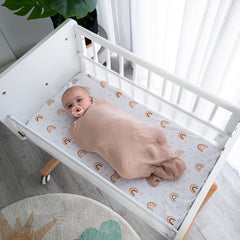 Comfy Cubs muslin swaddle blanket breathable cotton keeps baby comfortable in all seasons.
