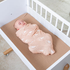 Comfy Cubs muslin swaddle rainbow pattern supports year-round comfort and gentle airflow.