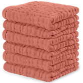 Comfy Cubs Muslin washcloths packaging in dusty rose, ideal for a gift-ready baby shower.