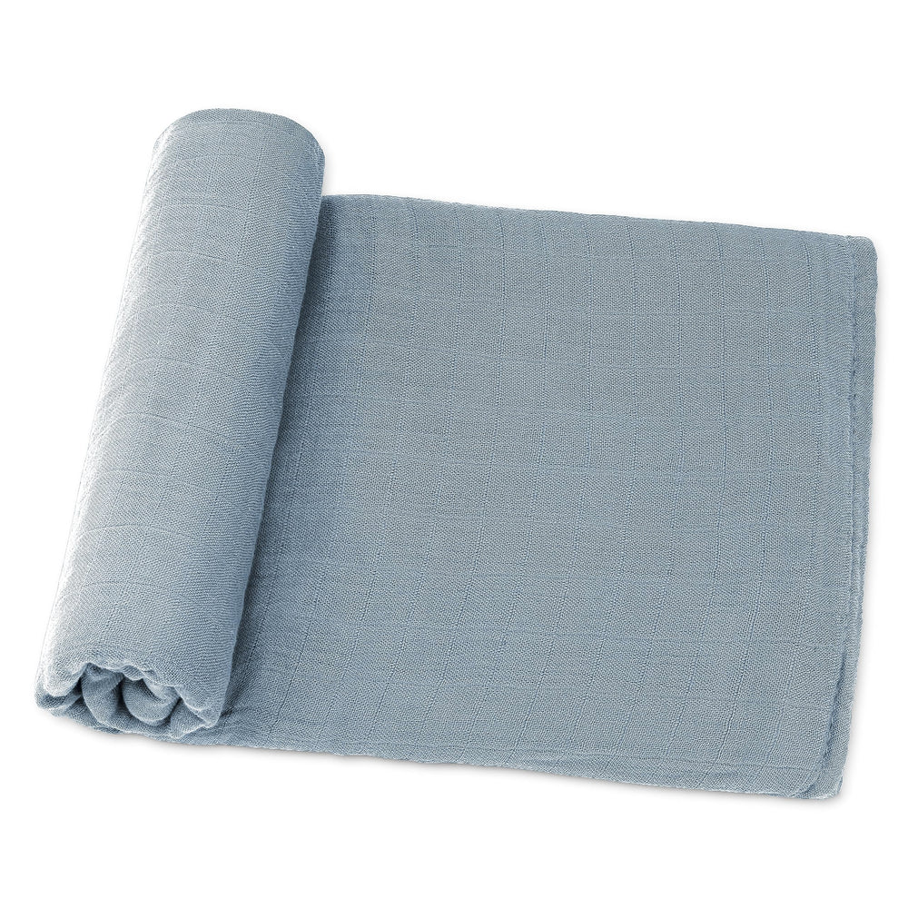 Comfy Cubs Pacific Blue muslin swaddle flatlay showing breathable fabric for newborn comfort.