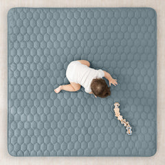 Comfy Cubs square Pacific Blue mat with non-slip bottom for stable play.