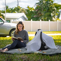 Comfy Cubs universal fit car seat cover on standard seat demonstrates versatility