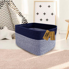 COMFY-HOMI rectangular dark blue basket in nursery for soft storage.