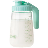 COMI breast milk pitcher inside fridge shows heat resistance for safe storage.