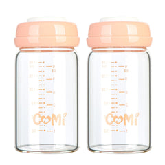 COMI wide-neck glass bottle with pink lid is leakproof for pumping.